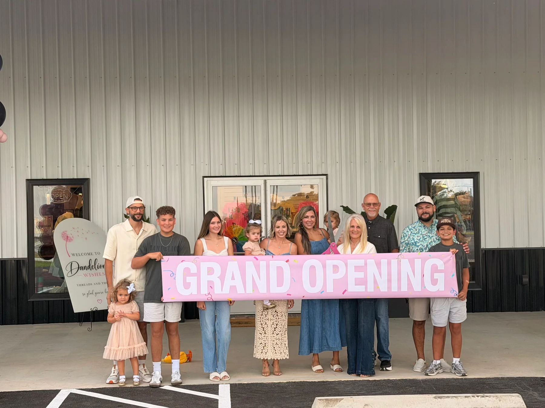 The Dandelion Wishes family celebrating the grand opening